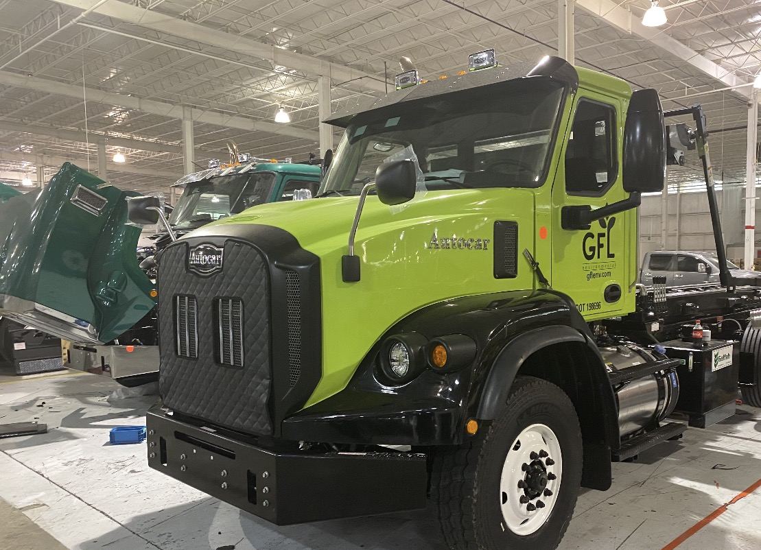 Lime green and black fleet truck, finished in the shop