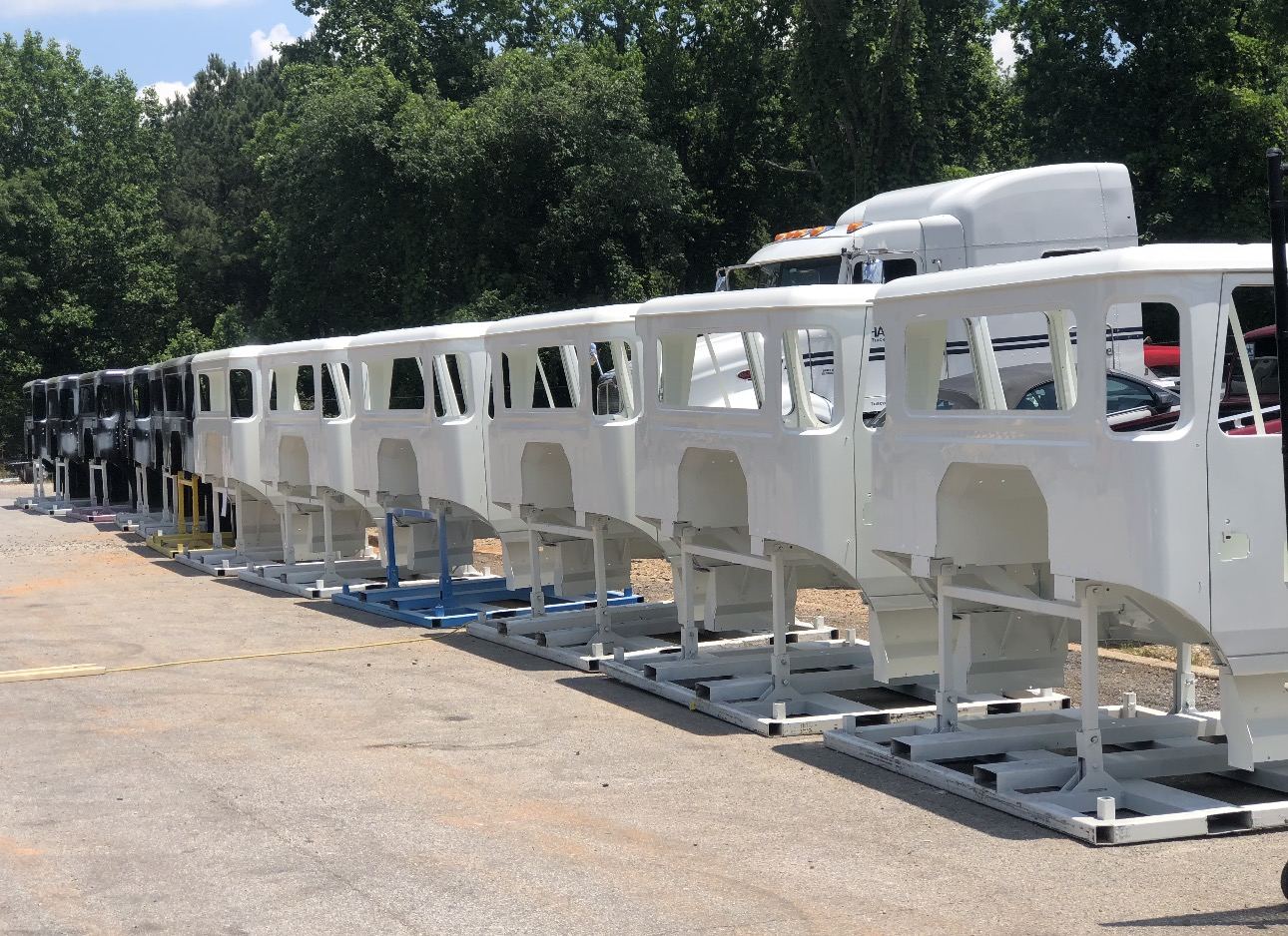 A row of finished white cabs